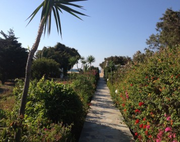 Walk under your residence through a beautiful garden leading to the beach